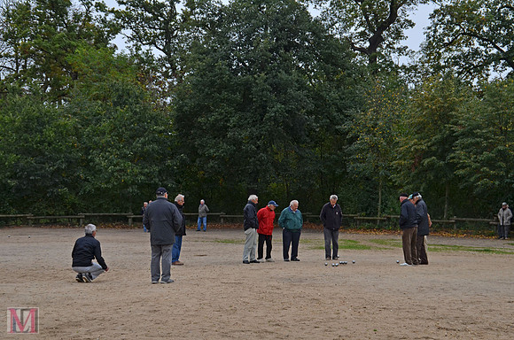 The game of Boules which is also known as Petanque in the Bois de Boulogne