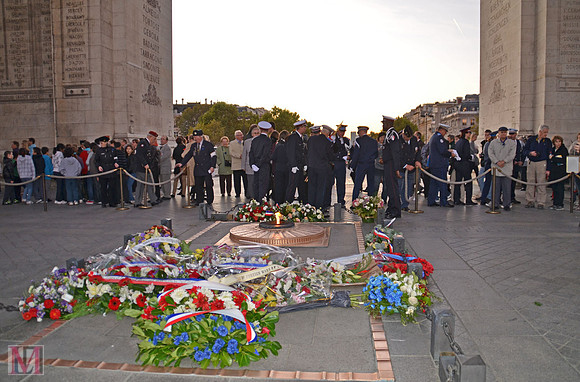 Celebrations at the Eternal fire for the Unknown Soldier beneath Arc de Triomphe